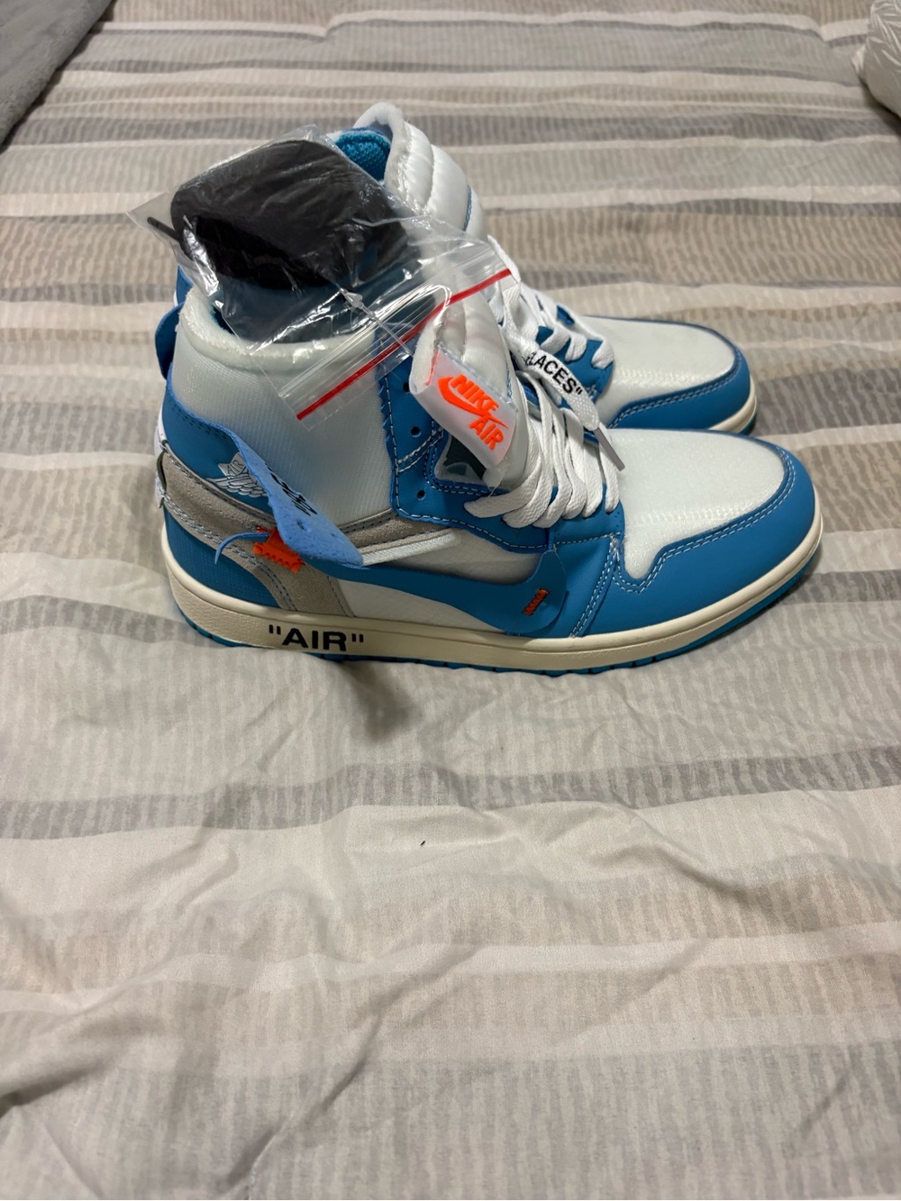 Jordan Men’s High-Top Sneakers in White and Blue with Orange Accents